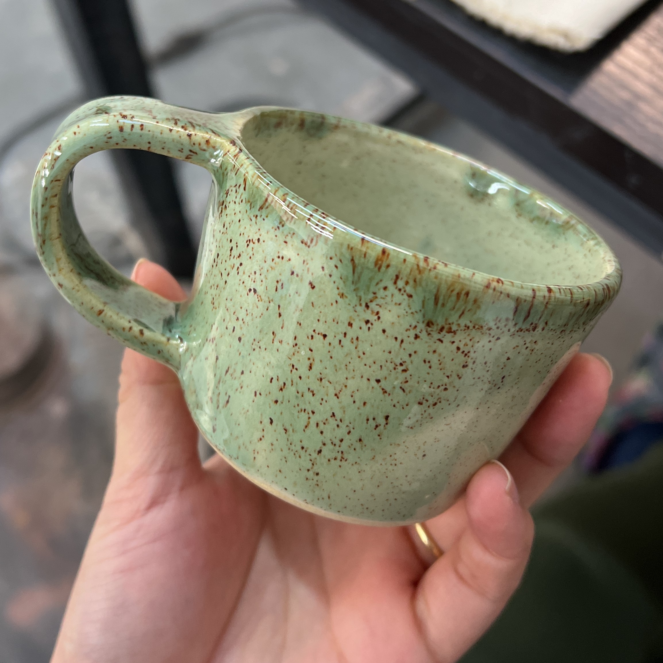 small speckled green mug