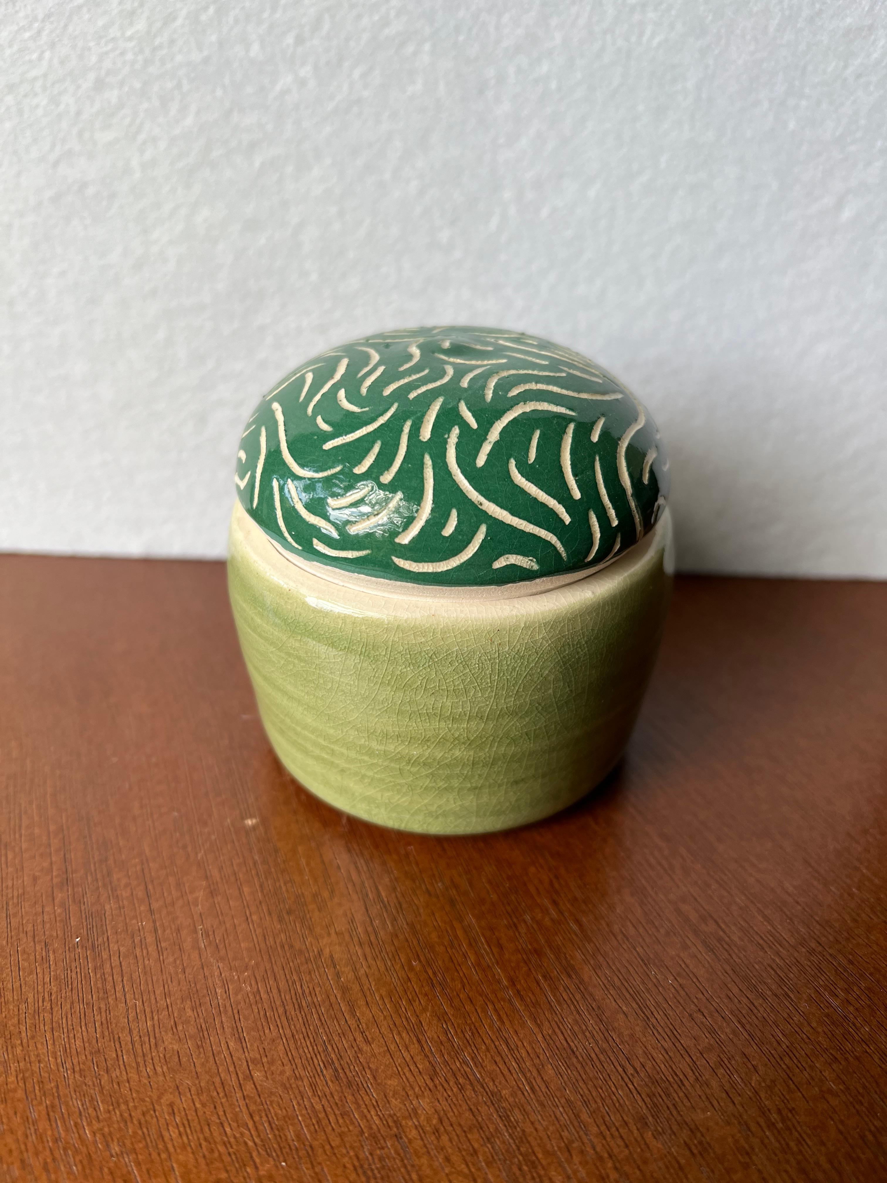 Green carved jar